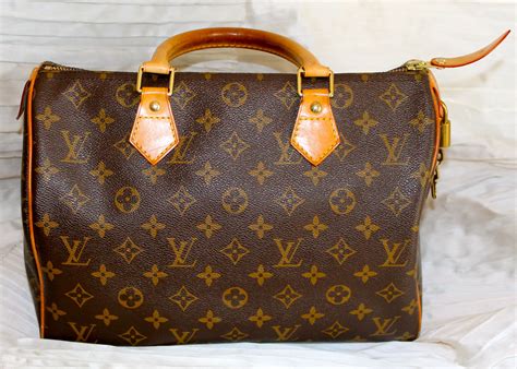 borsa lv lucchetto|Borsa bauletto Speedy 30 Louis Vuitton: Prezzi e nuove versioni.